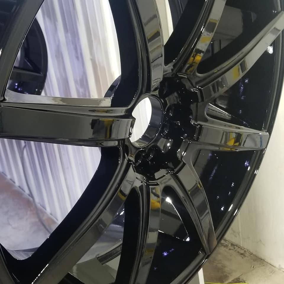 a car's rim, finished with high quality powder coating